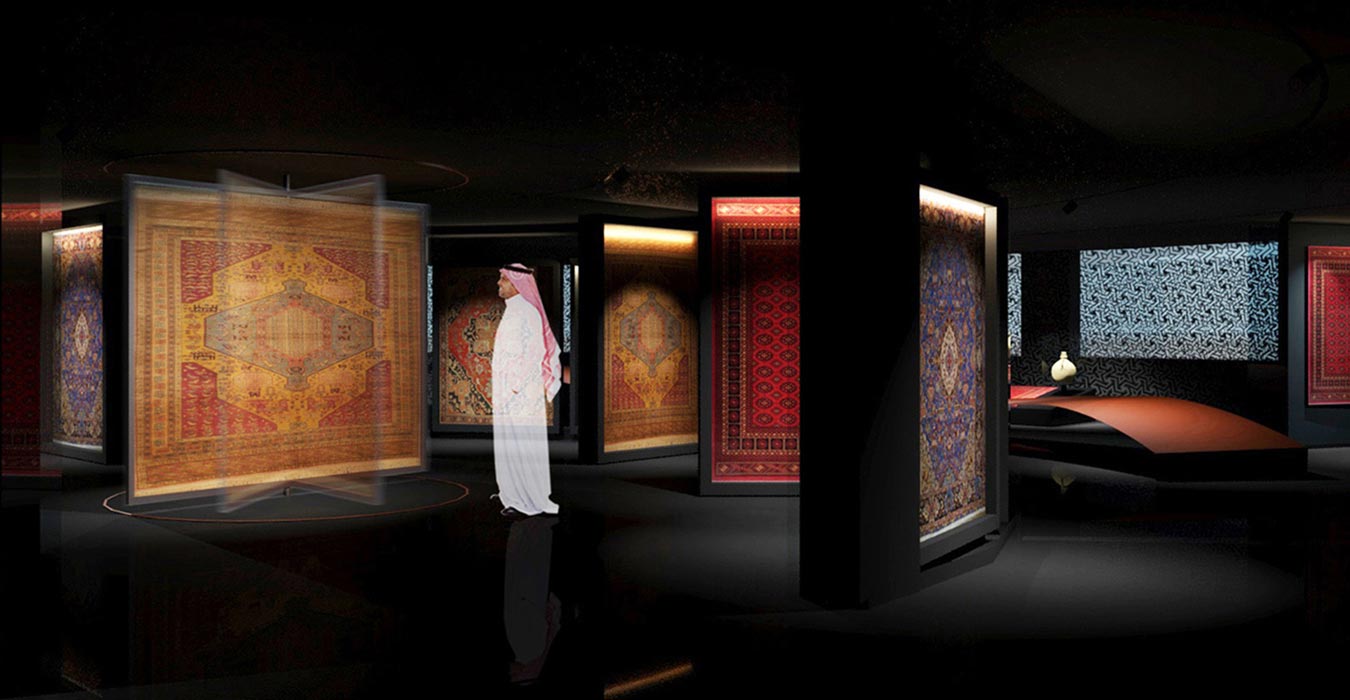 A revolving carpet case shows both sides of the exbibit in the Carpet Museum. 