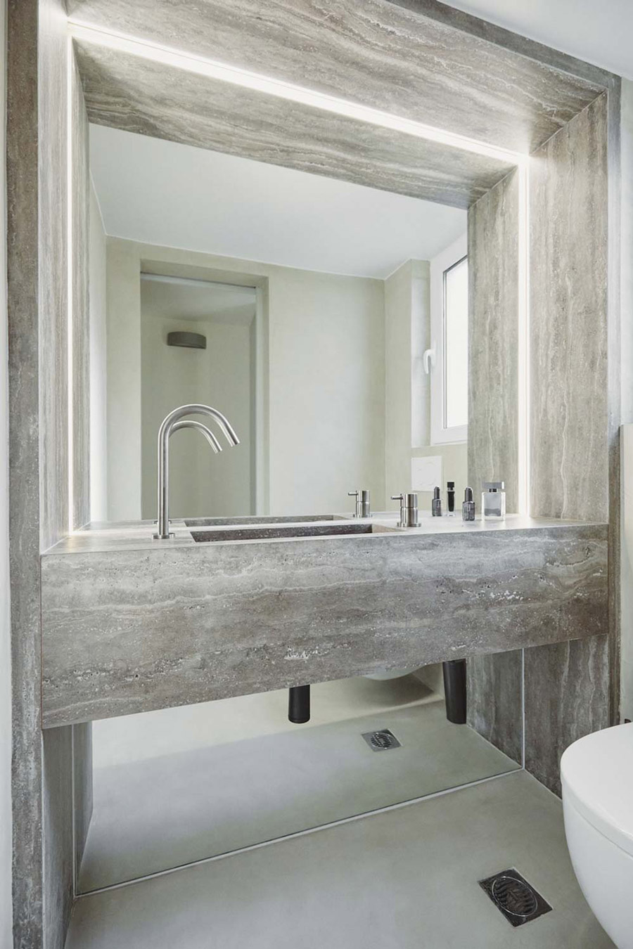 Custom bathroom sink from granite tiles.