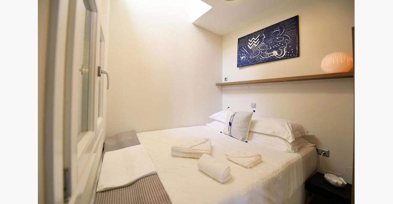 Bedroom interior design details of a vacation house in Hydra.