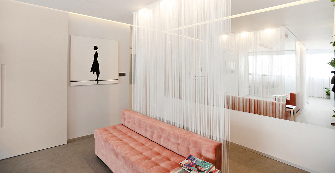 The wall to wall mirror doubles the new interior architecture 