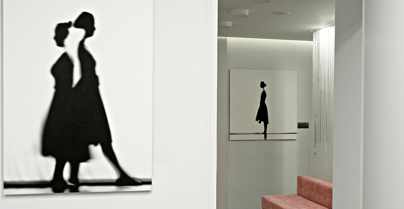 Art frames with girls in shadow.