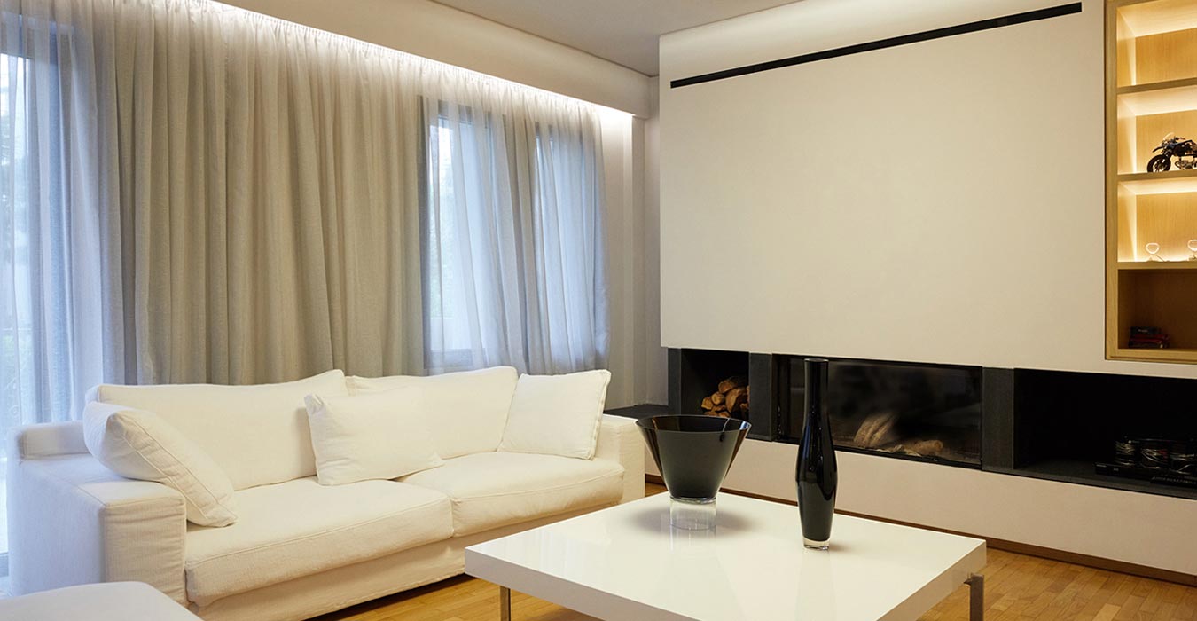 Living room interior with an energy wood fireplace tailor-made wooden structure.