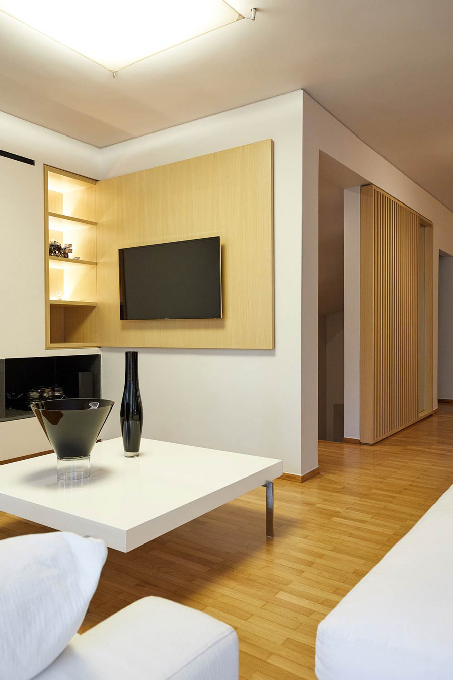 Modern wooden structure in a living room.