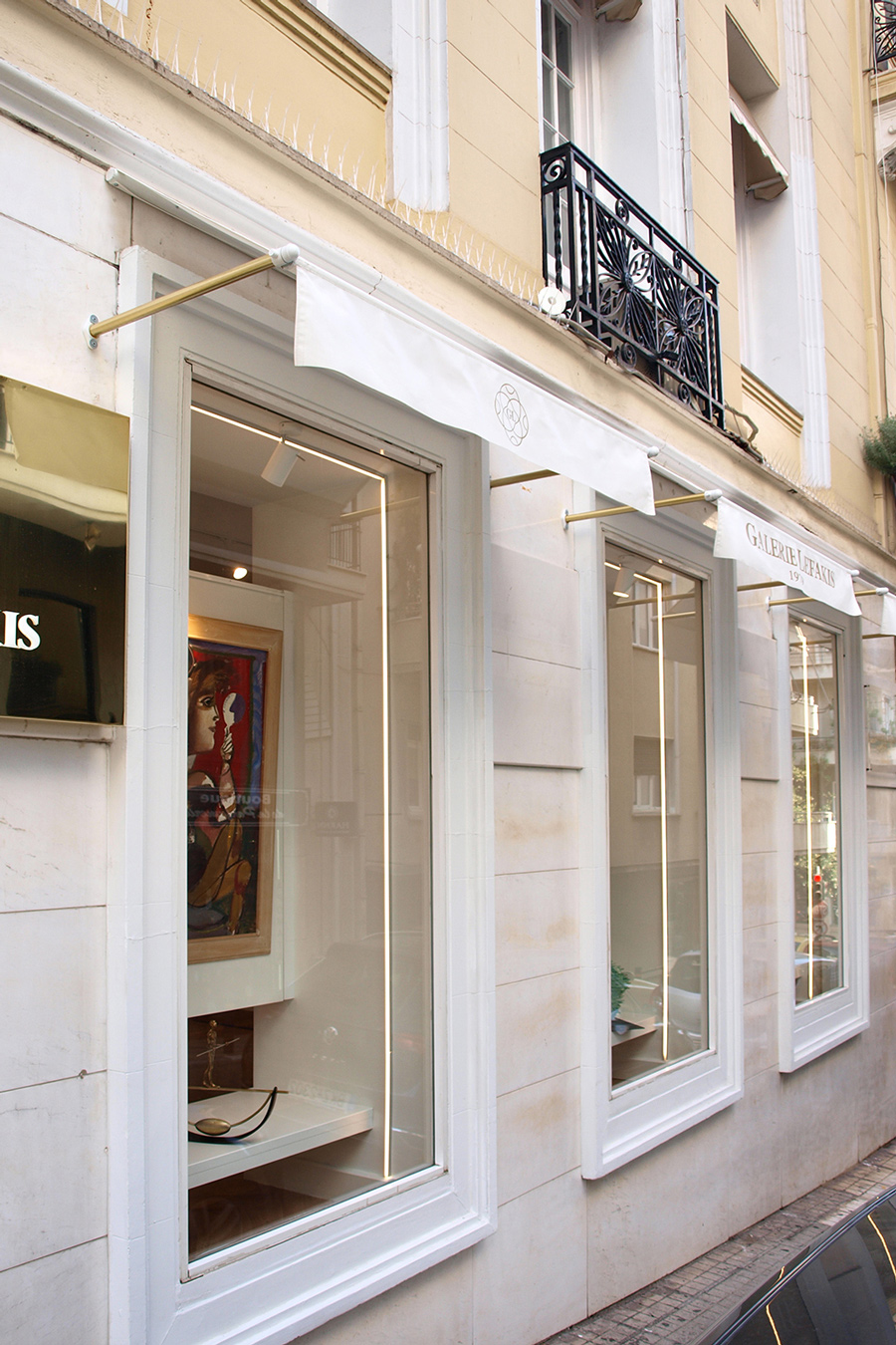 Linear led lighting is highlighting the shop windows