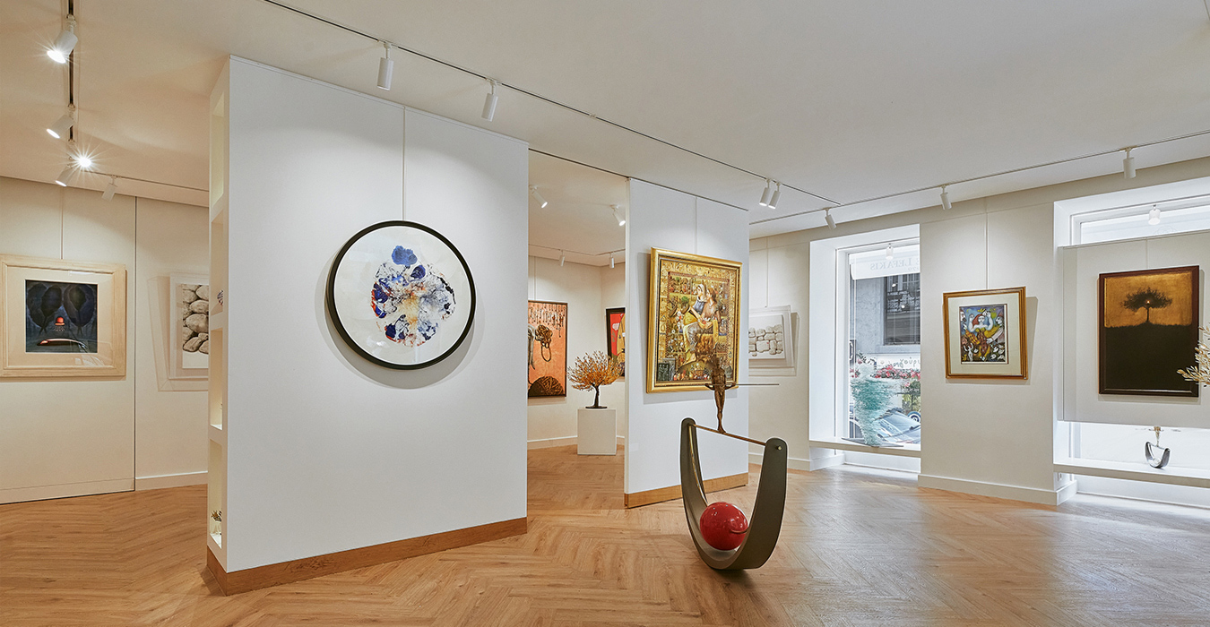 The art gallery’ s floor is paved with wooden herringbone planks