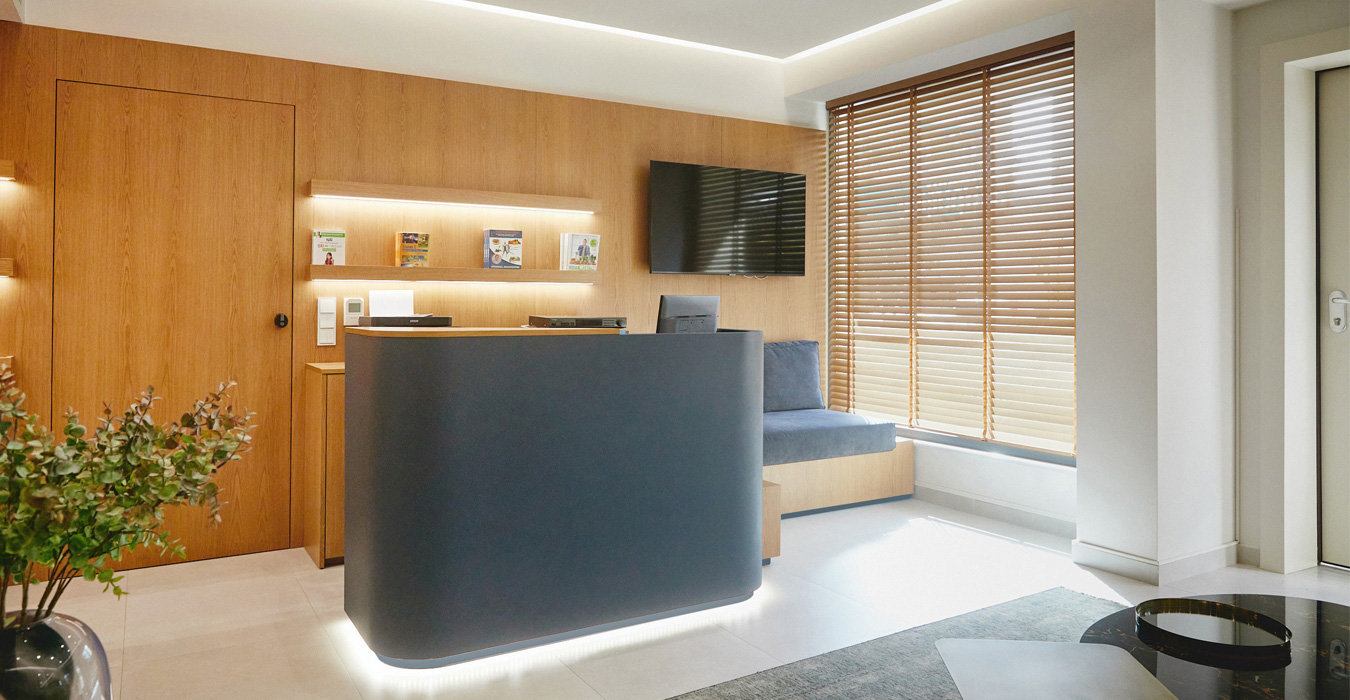 Custom made wooden constructions dominate in the reception area