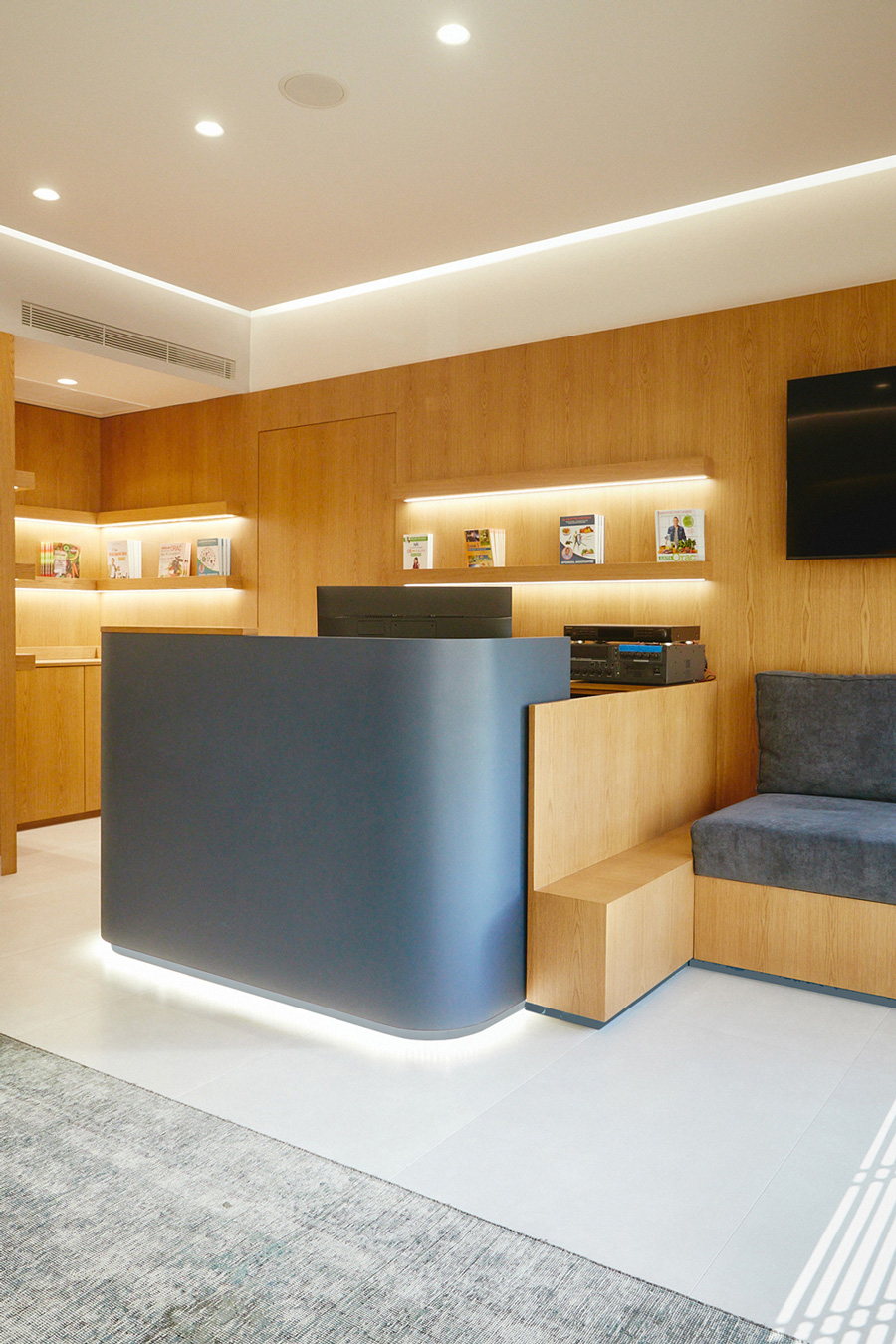 A wooden show case for books hosts the nutritionist’ s publications