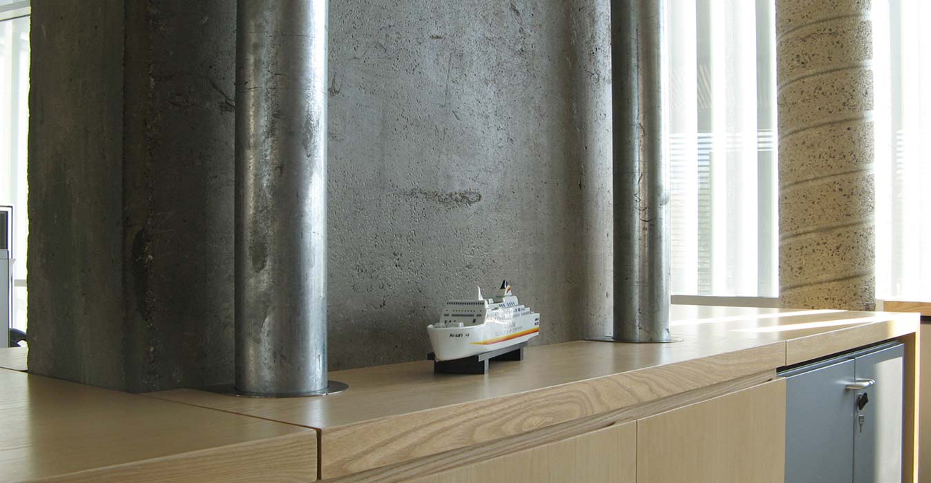 Chiseled cement columns in accordance to metal stationing cupboards